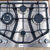 موقد غاز مسطح  من علامة Hotpoint، يتميز بتصميم عصري مصنع من الفولاذ المقاوم للصدأ (Stainless Steel